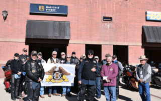 Yavapai Harley Owners Group stands with Site Director Nick Wood from Nation's Finest-Prescott