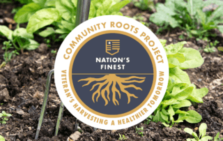 Community Roots Project logo on garden background